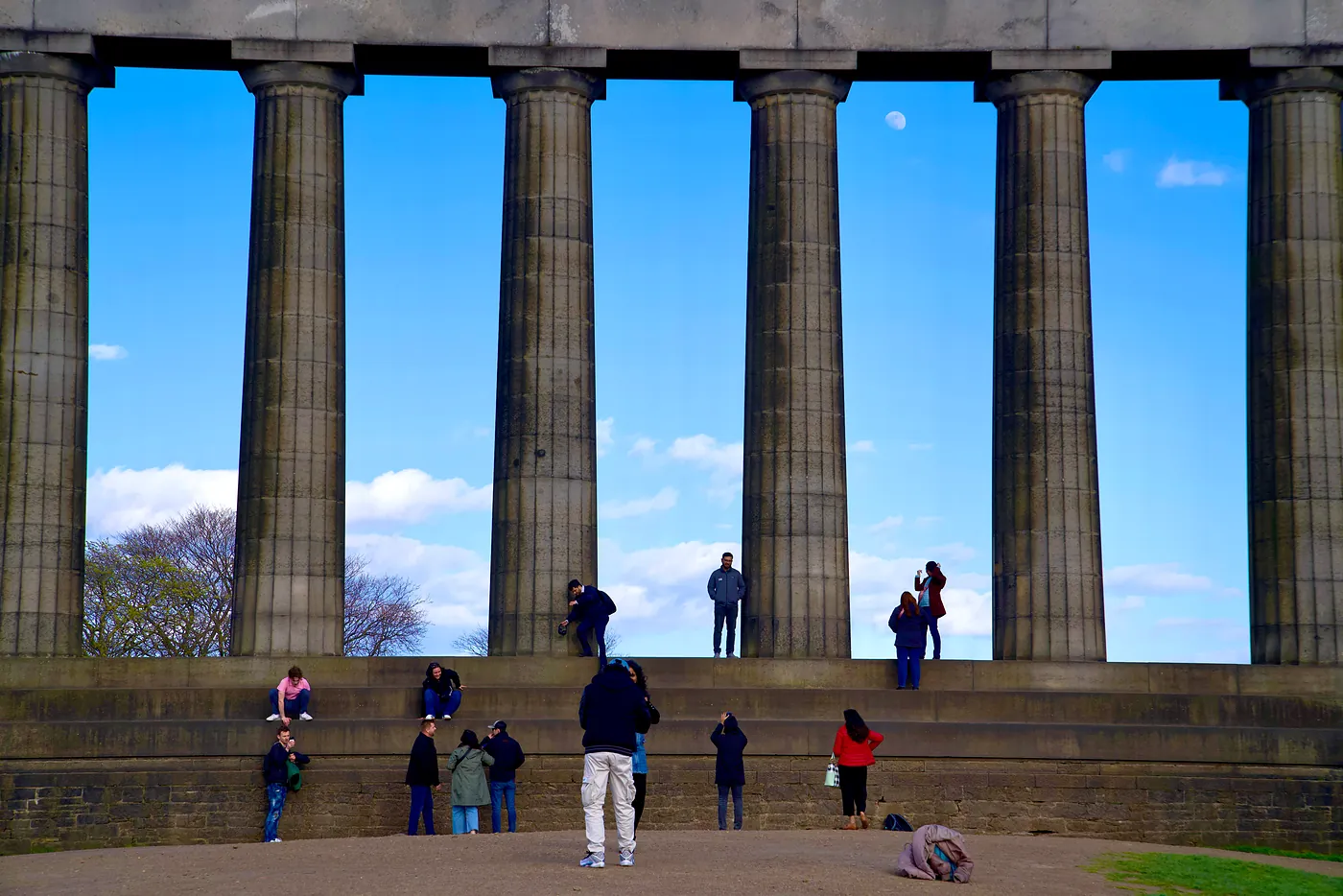 People climbing the Disgrace's steps.
