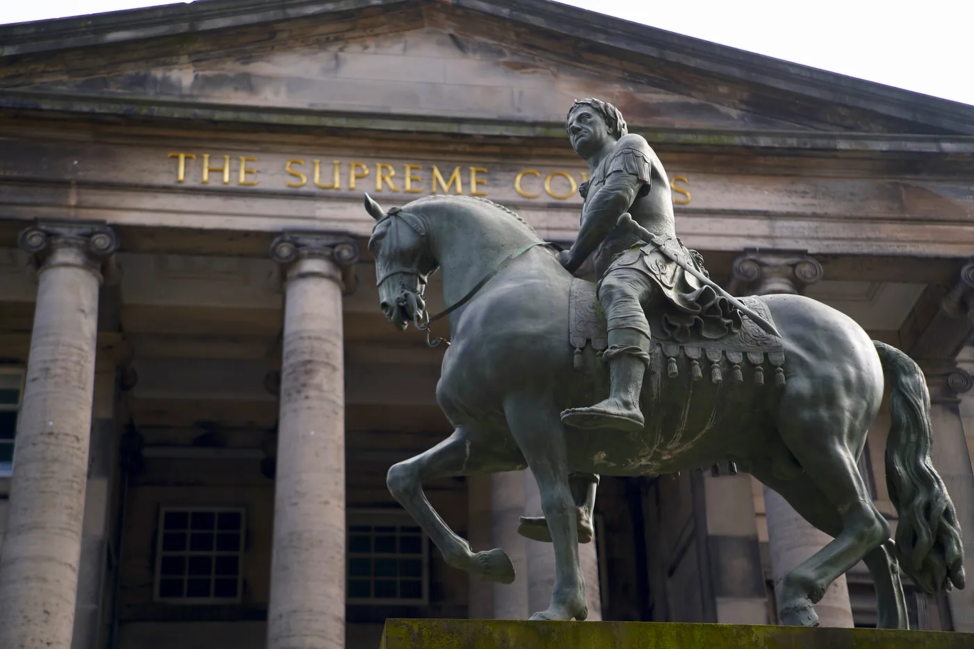 The equestrian & Romanized statue of Charles II between Saint Giles' Cathedral and the Parliament House, in which resides the Supreme Civil Court of Scotland.