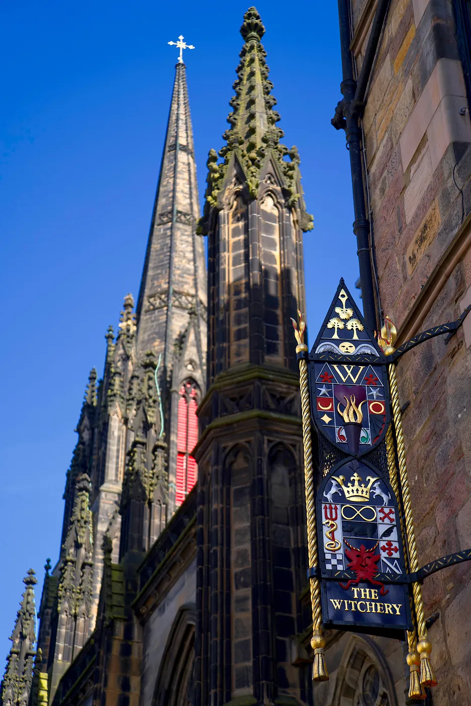 A signpost of the Withcery, a famous hotel, built next to the Church of Saint Columba.