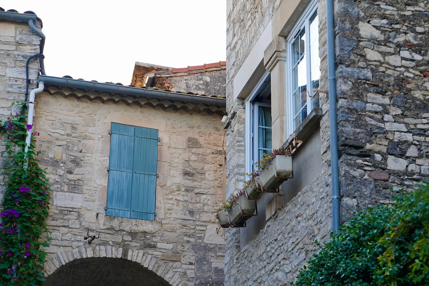 The opened window of a residence above the Western Gate.