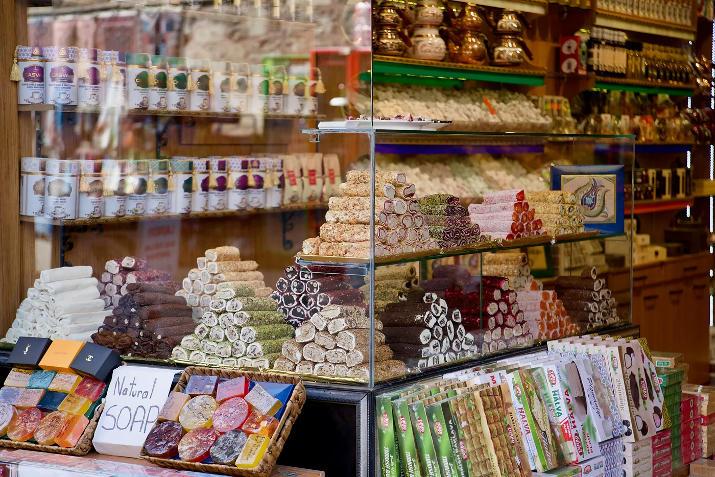 Piles of traditional pomegranate, pistachio, chocolate, and other Turkish delights in a lokum.