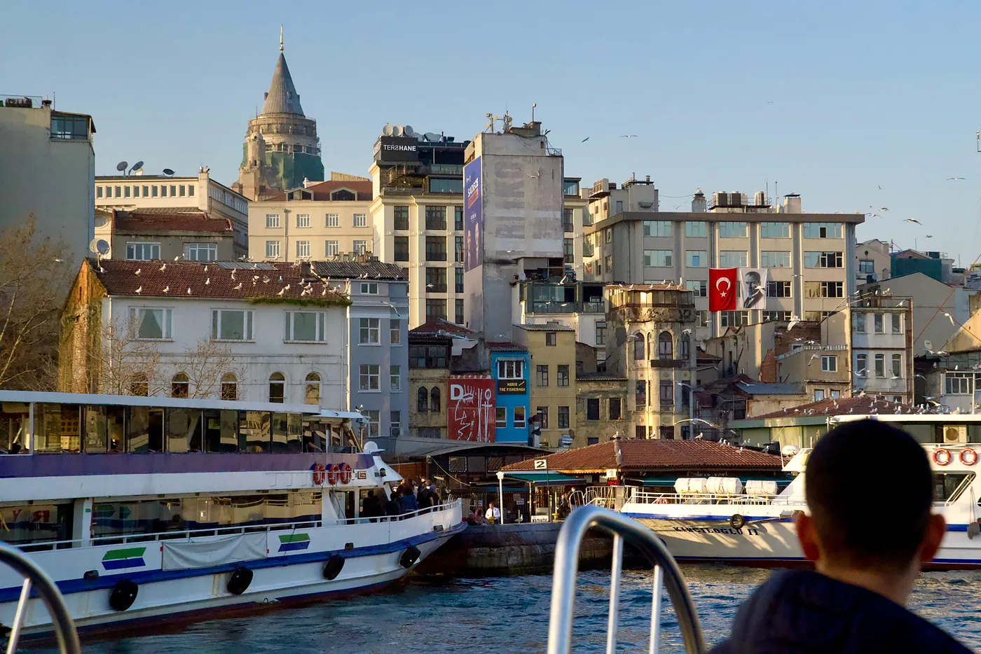A view of the Galata tower from the ferry stop at the north end of the Golden Horn.