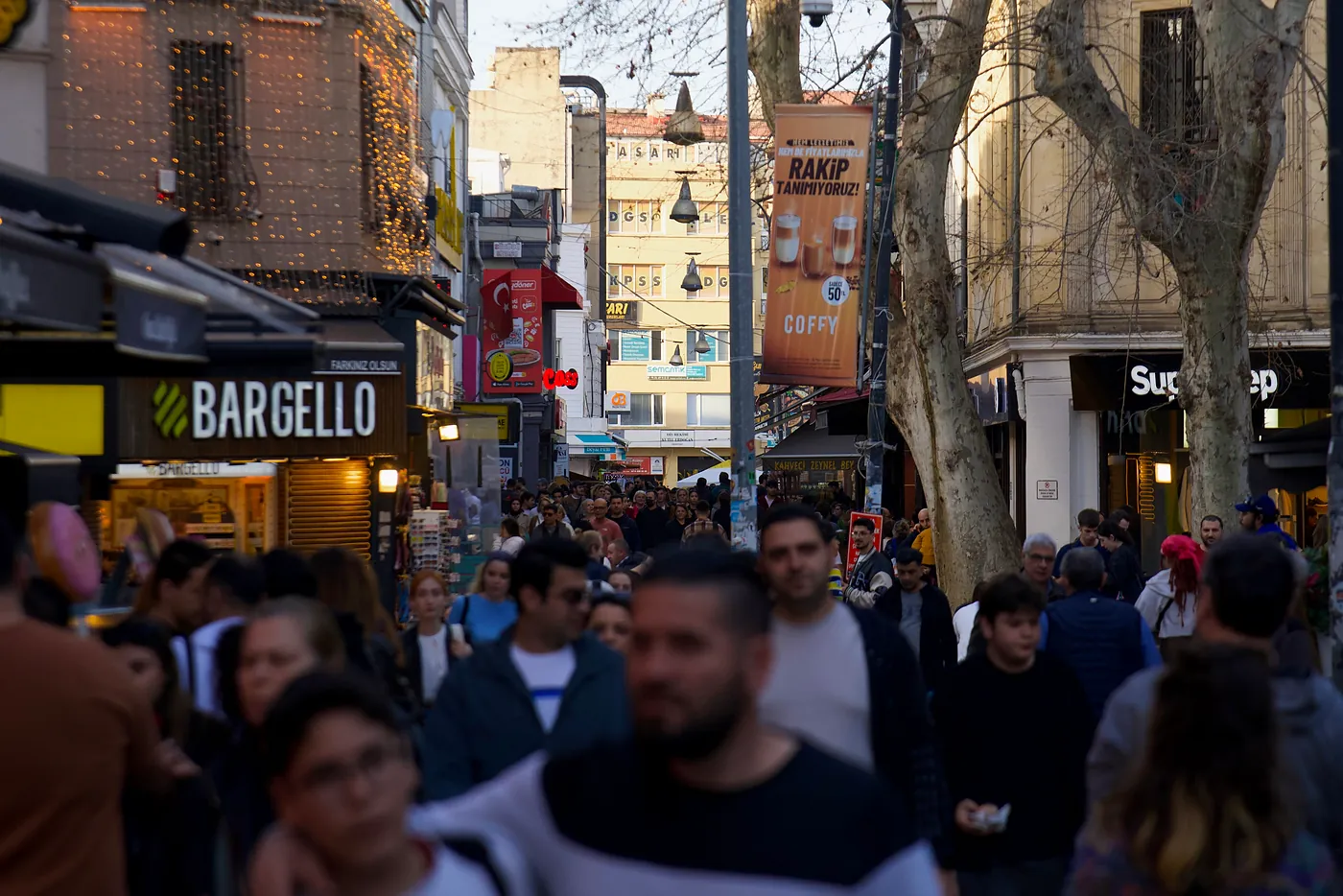 Turks traversing through Kadıköy's busy city blocks.