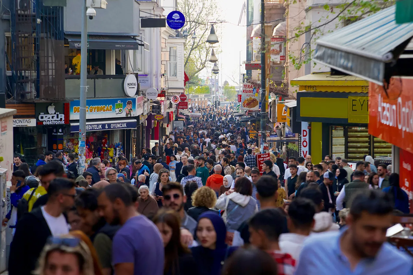 A sea of people navigating through Kadıköy's commercial core.