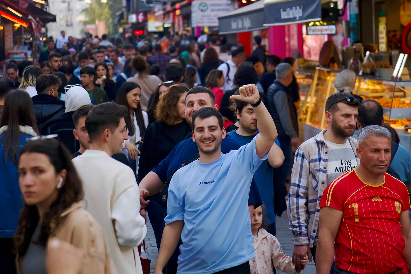 A group of Turkish friends admiring a photographer,