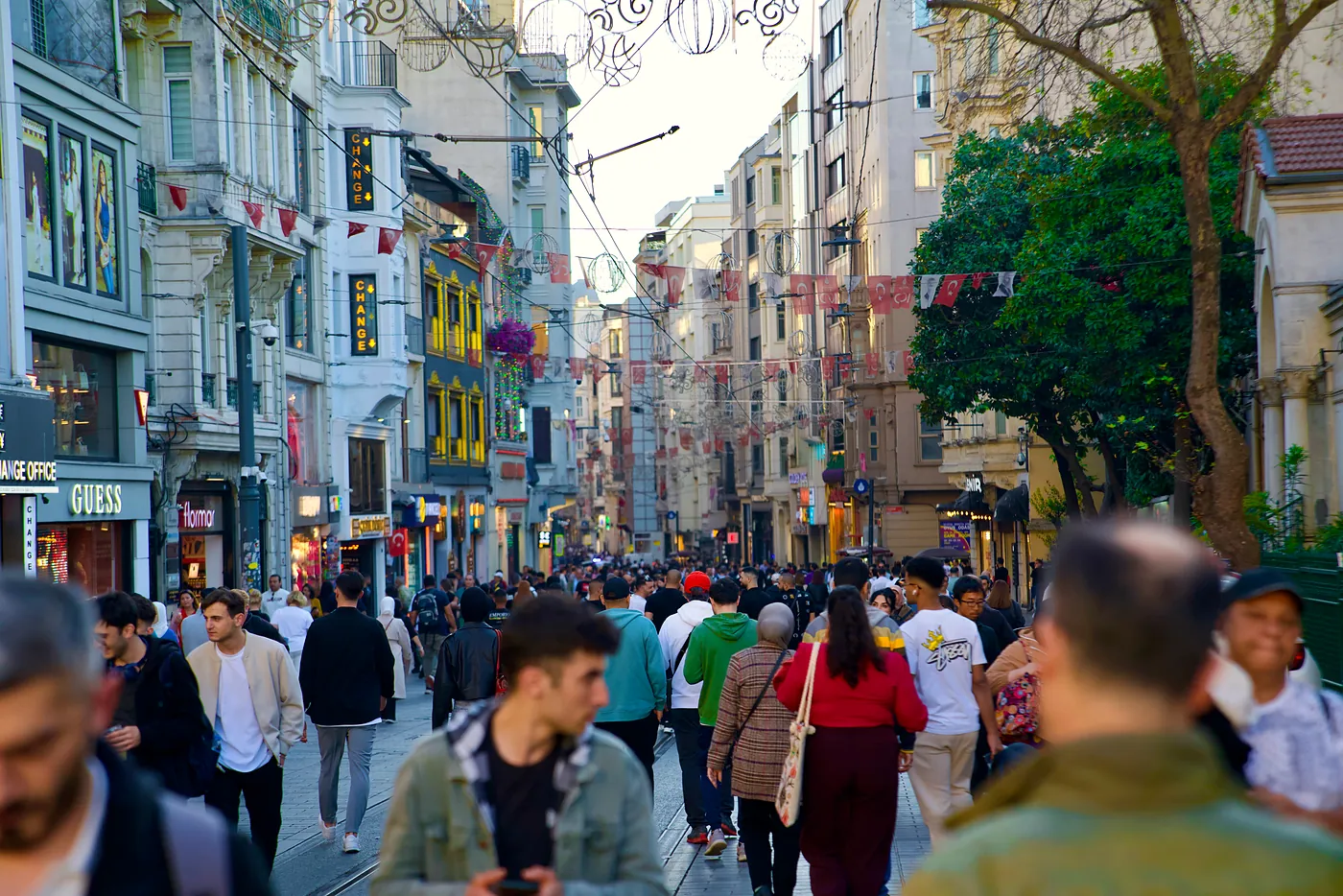 People walking down and up the famous Siraselviler street.