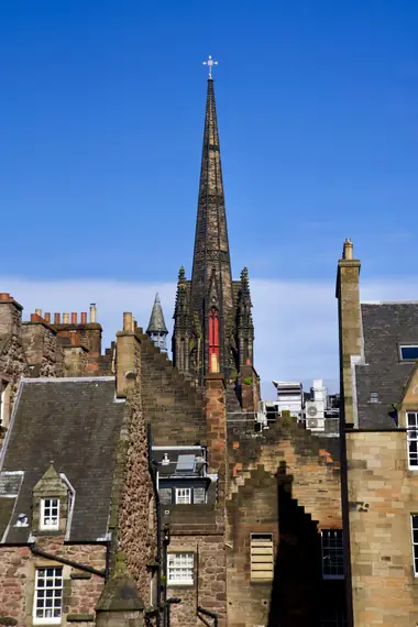 The Hub's Gothic spire rising above the rooftops of the Royal Mile, Edinburgh